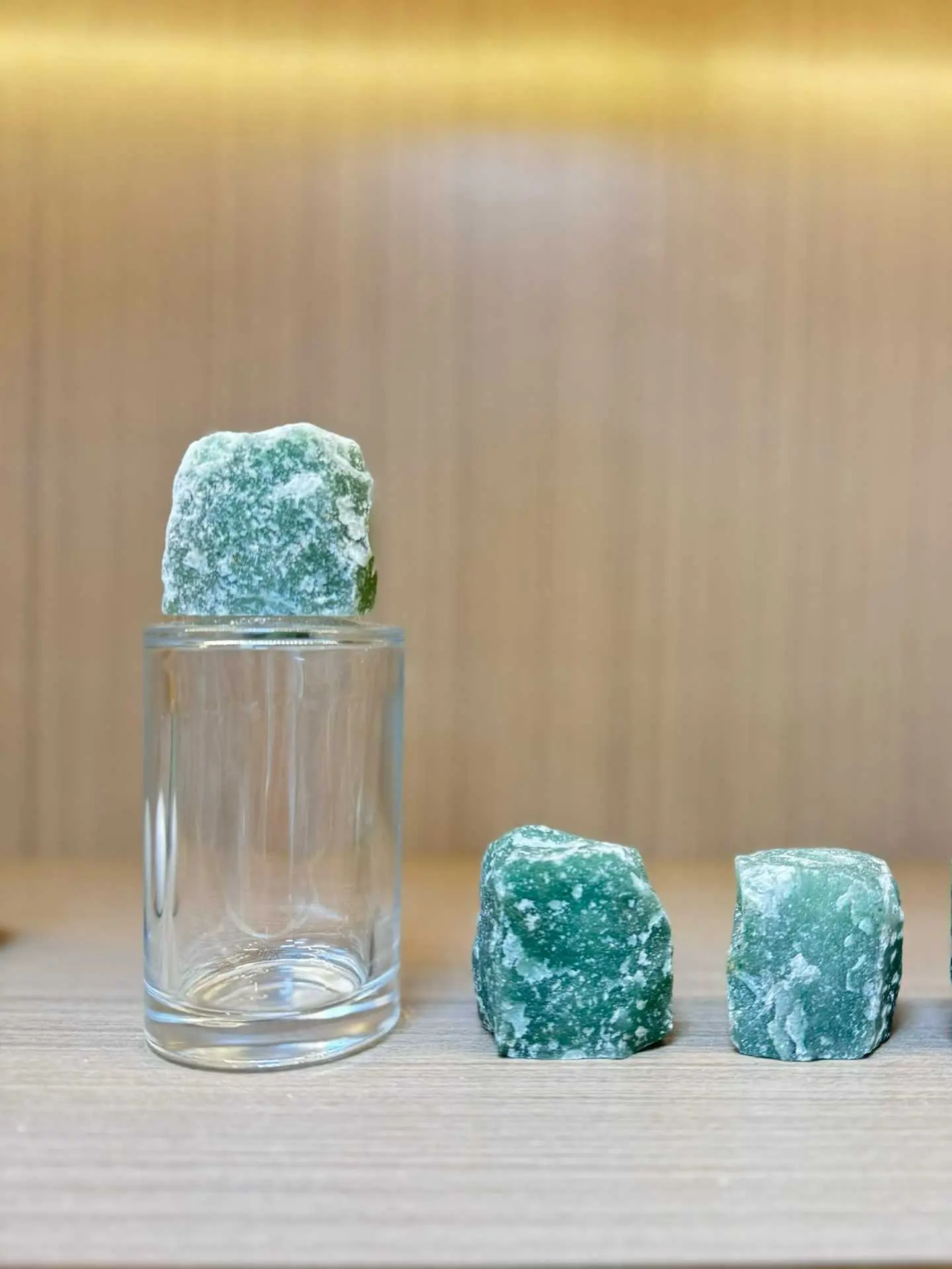 green crystal perfume bottle